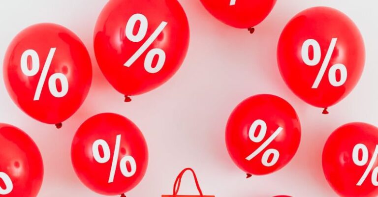 Ratios - A Red Paper Bag in the Middle of Red Balloons With Percentage Symbols