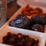 Dates - Close-Up Photo Of Raisins And Dates