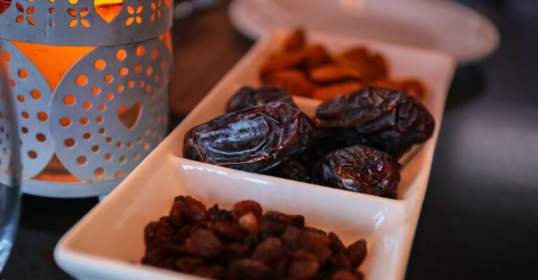 Dates - Close-Up Photo Of Raisins And Dates