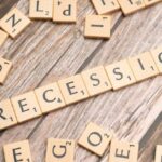 Downturns - The word recession spelled out with scrabble letters